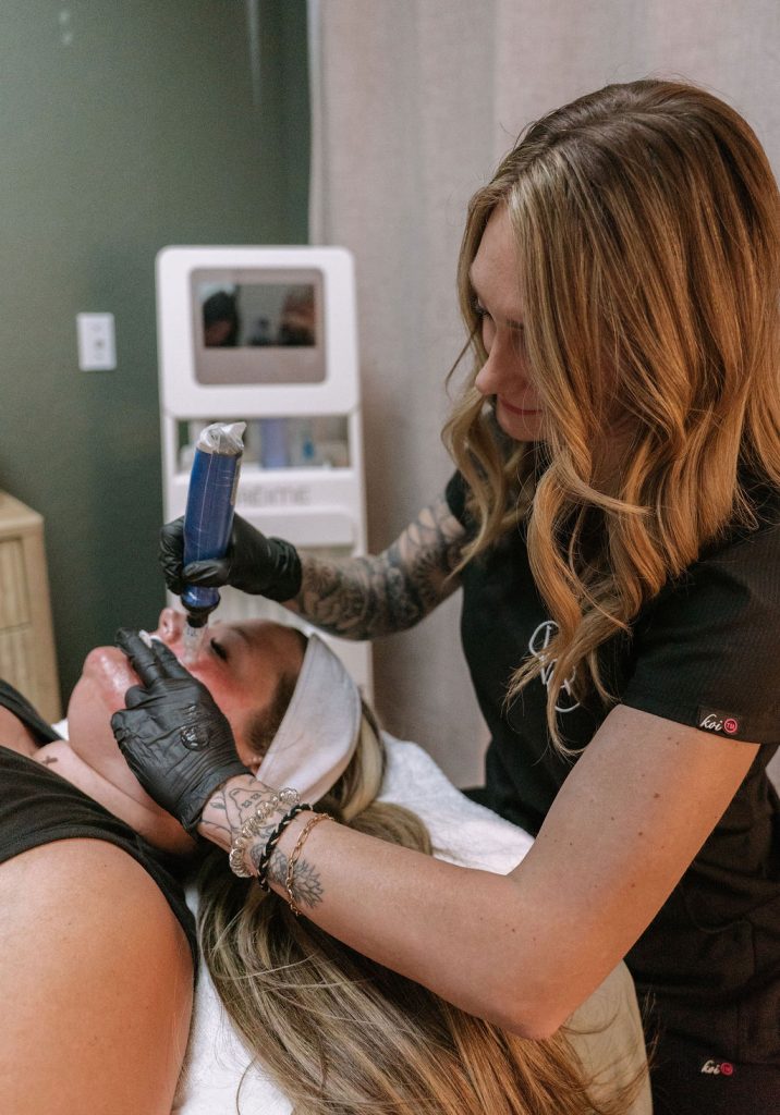 Provider performing SkinPen microneedling on a client at Carefree Wellness and Aesthetics in Phoenix, AZ